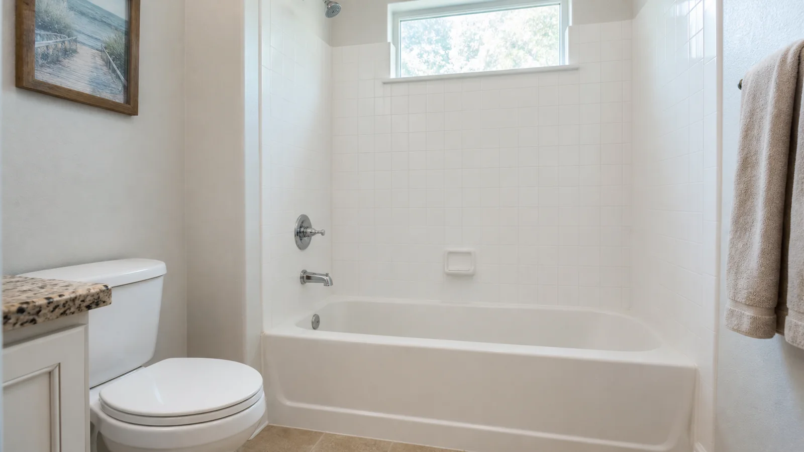Representative finished bathtub and shower installation with fixtures operating.